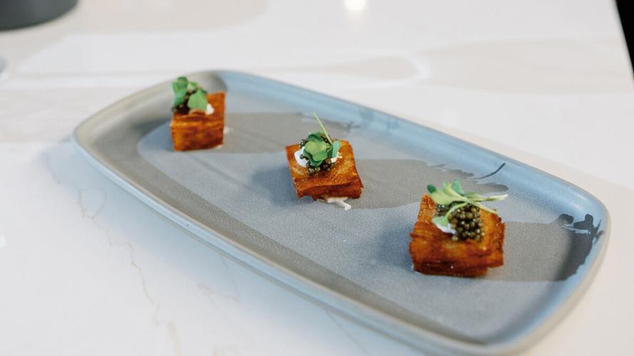Sturgeon caviar with duck fat chips at Vybe