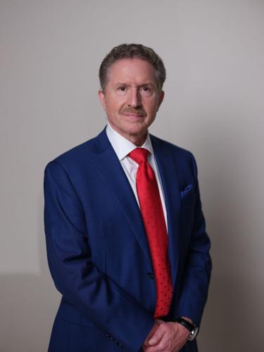 Lamelaa, Joseph MD - Cardiology - in suit.JPG