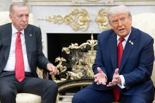 US President Donald Trump speaks to the press as he meets meets with Turkey's President Recep Tayyip Erdogan in the Oval Office