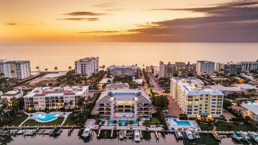 Naples bayfront penthouse with boat slip to auction