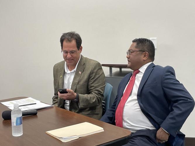 Joe Tiseo, left, Hector Flores, right, Lee-Charlotte conflict resolution meeting.jpeg