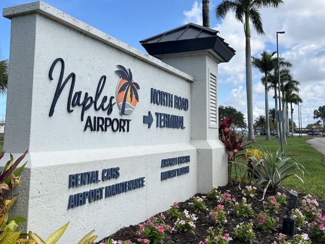 Roadside signage at Naples Airport.JPG