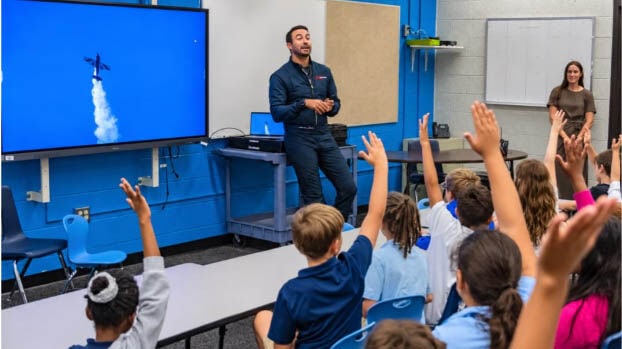 Air show pilot talks aviation with Charlotte students