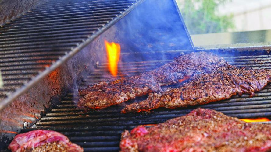 Chef Jeff Mitchell grills skirt steaks over high heat
