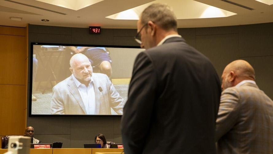 Forest Development's Sam Bauer next to Founder and Managing Partner Peter Baytarian, who is speaking to the Council.jpg
