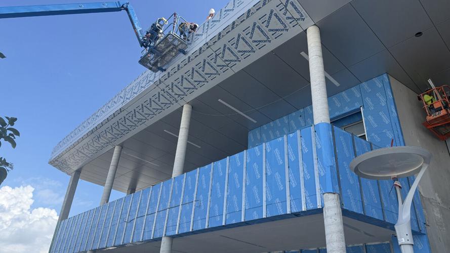 Workers put finishing touches on new campus
