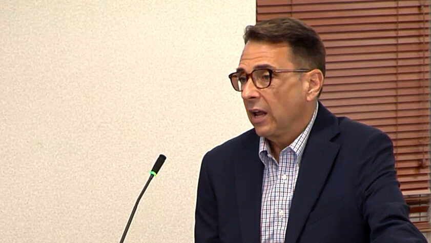 Tourism director Jay Tusa presents report