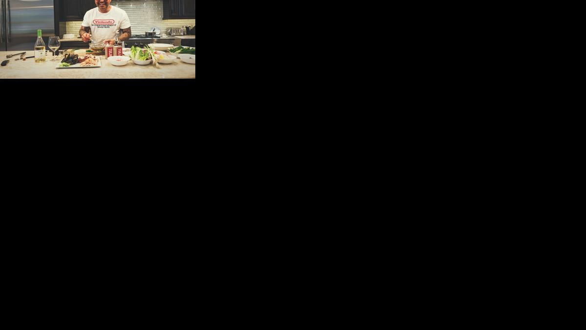 Portrait of Betulia cooking