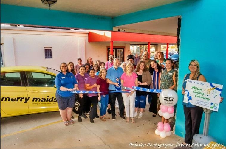 Merry Maids ribbon-cutting