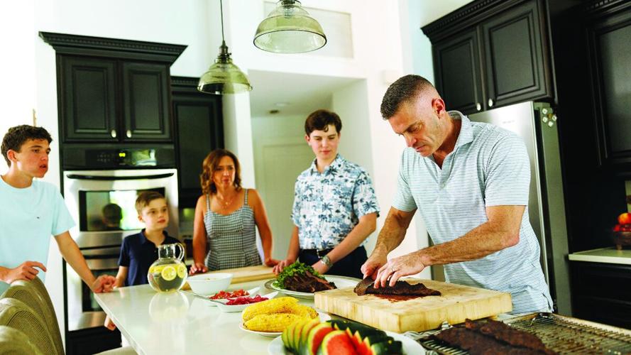 The Mitchell family gathers for a backyard cookout