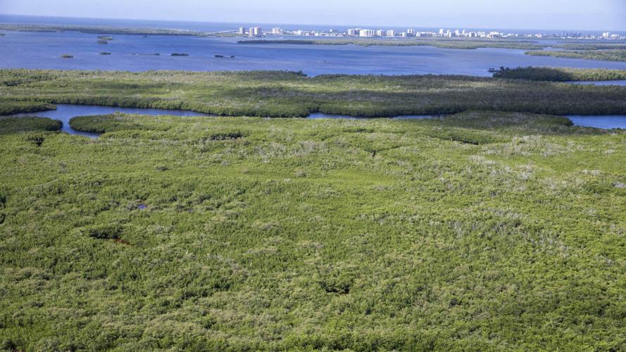Island at West Bay Club residences overlook Estero Bay