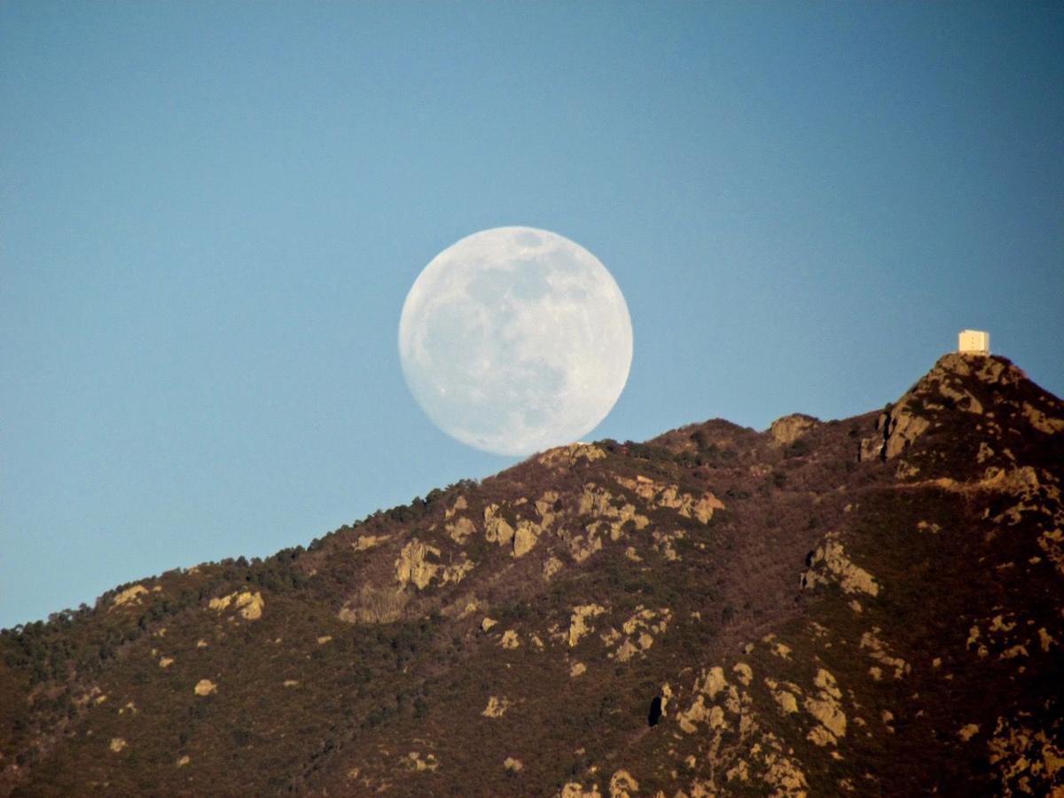 Moon on the mountain.