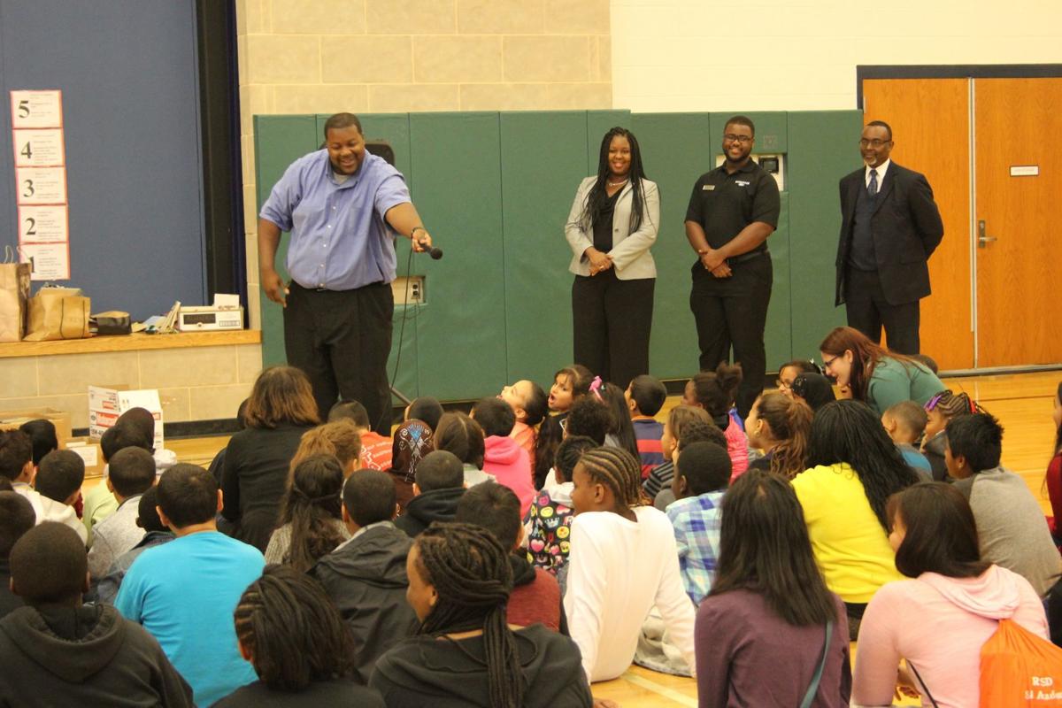 Henderson Ford Parades Ford Explorers to Drop off Book Donations