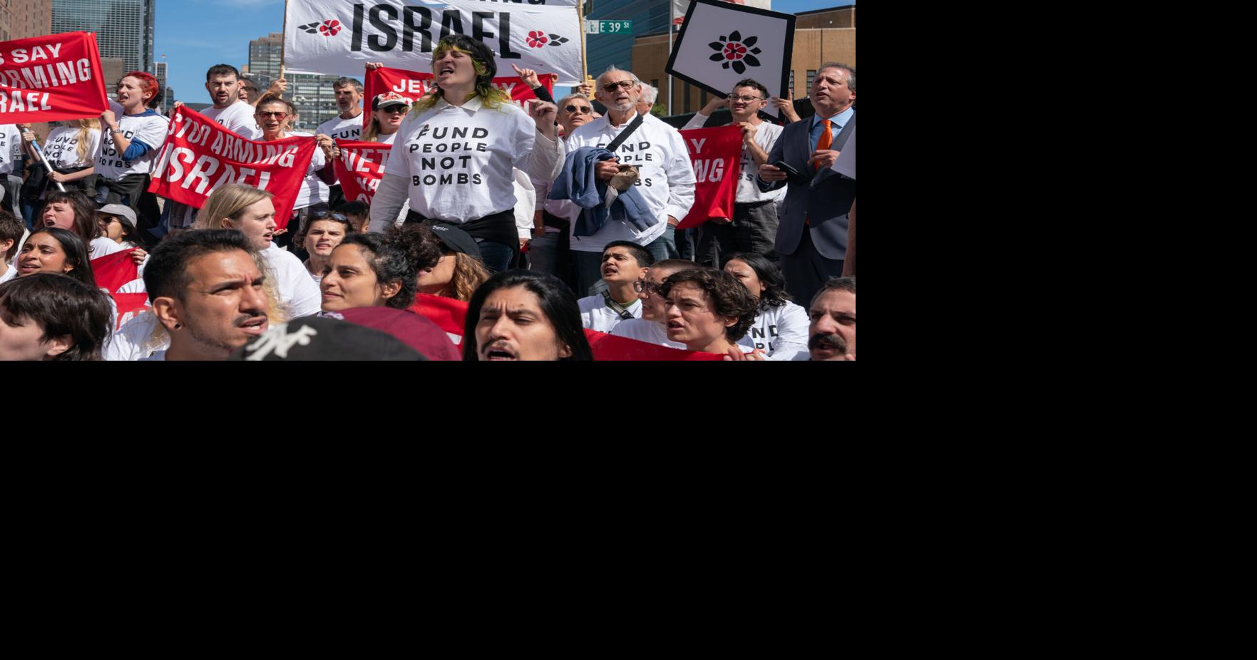 Pro-Palestinian protesters block First Avenue at East 39th Street in protest of Israeli Prime Minister Benjamin Netanyahu