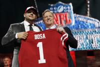 Washington State tackle Andre Dillard shows off his new jersey after the  Philadelphia Eagles selected him in the first round at the NFL football  draft, Thursday, April 25, 2019, in Nashville, Tenn. (