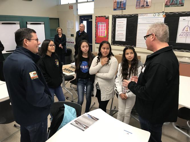 Salas presents check to John Muir Middle School Local News