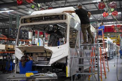 071421-BYD-Buses-Factory-Workers-REUTERS-CM-01