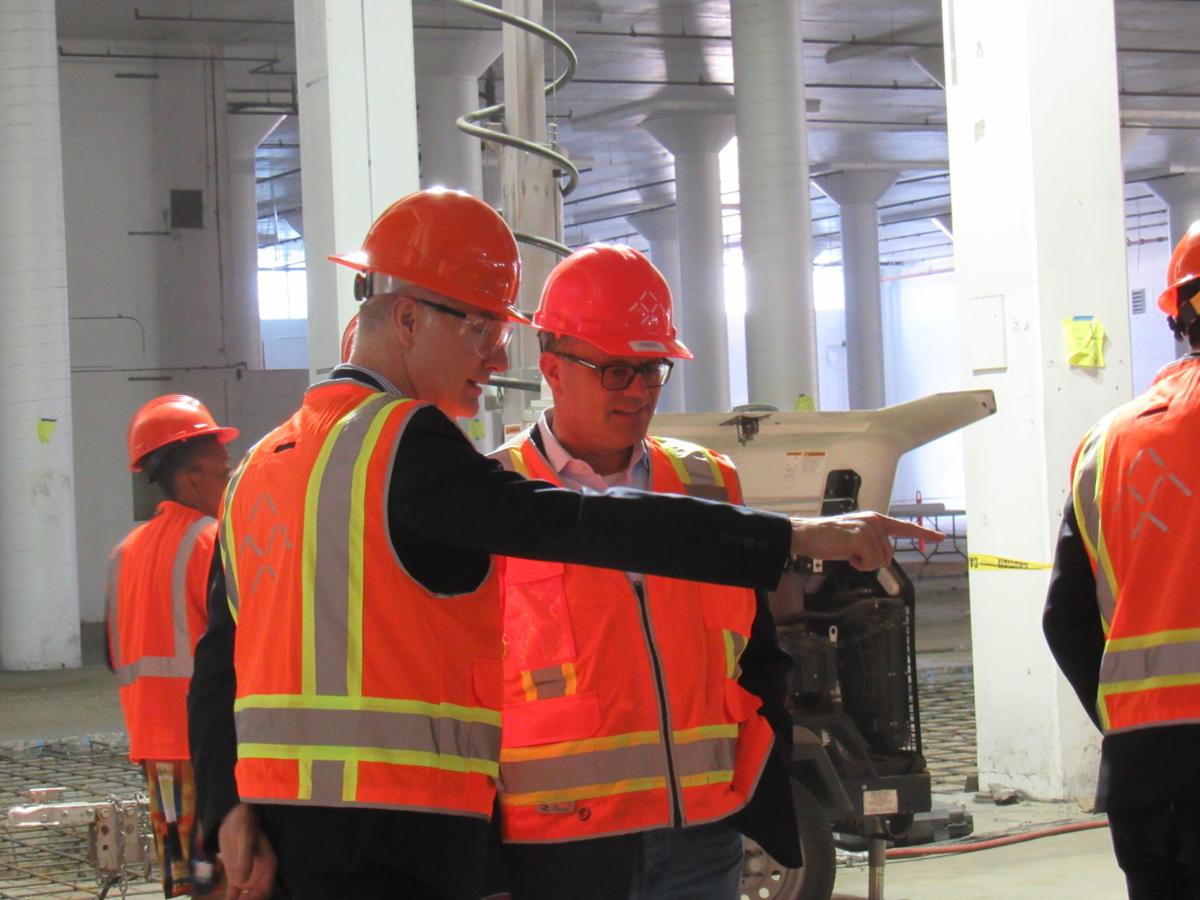 Faraday Future Receives Permit From City Local Hanfordsentinel Falco Digiallonardo Vice President Of Bernards Points Something Out To Dag Reckhorn Senior Global Manufacturing At Faraday Future