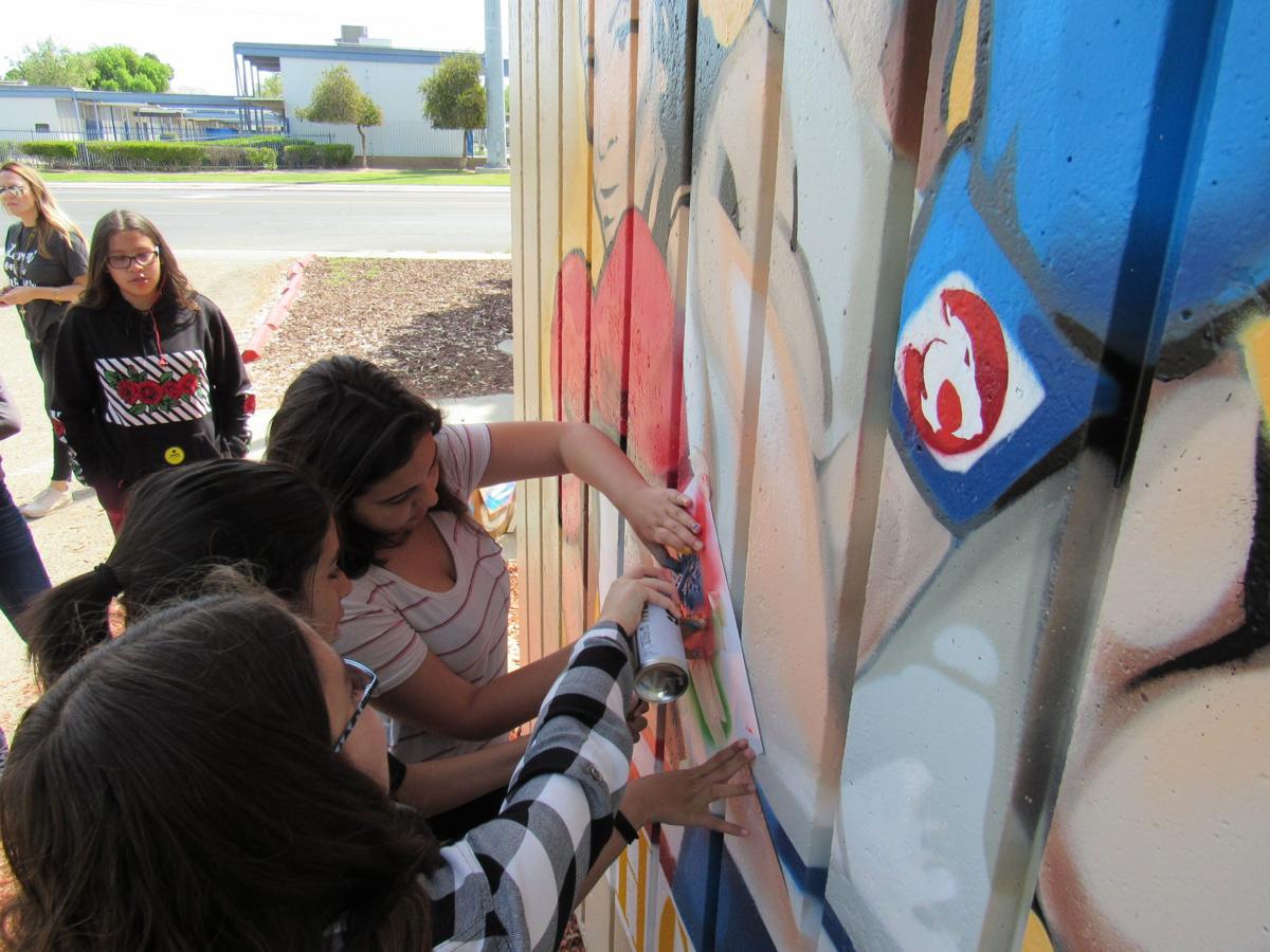 Community Artists Paint Hanford Pal Signs Local