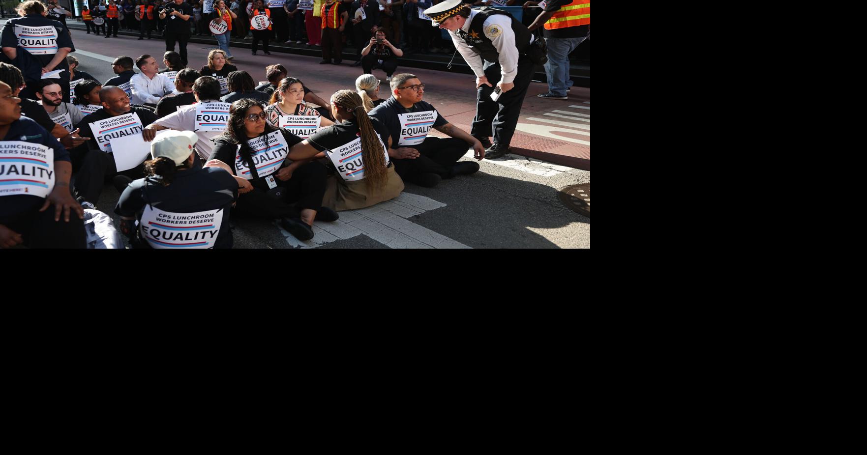Chicago Public Schools lunch workers block traffic in protest outside the Board of Education as contract negotiations stall