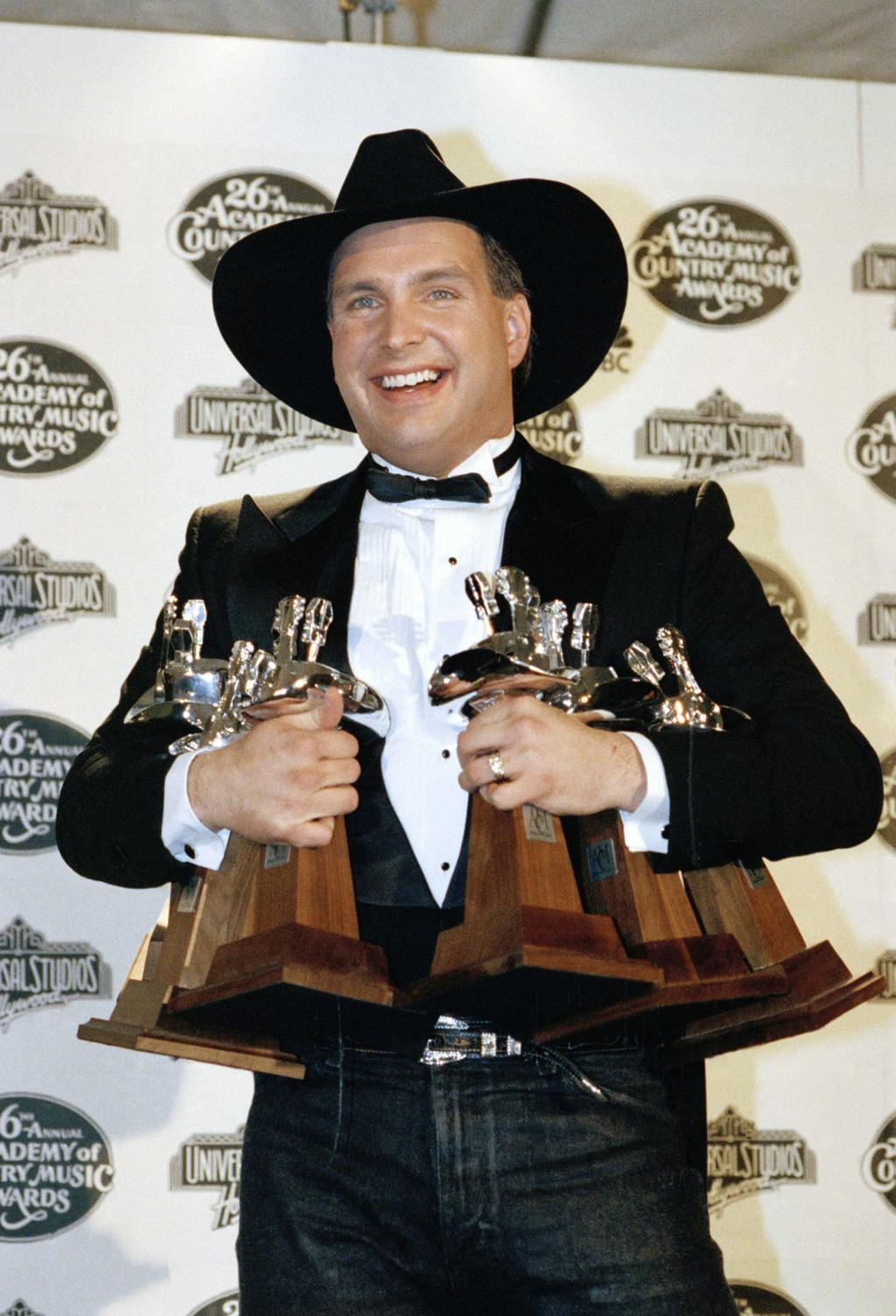 Garth Brooks plays ball with the San Diego Padres at spring