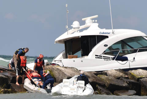 Injured man rescued from New Buffalo breakwater rocks | News