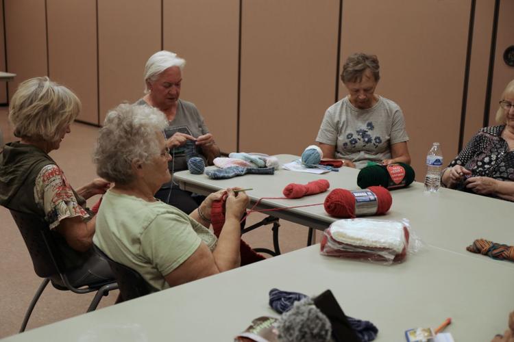 Knotty Knitters group starts preparing to decorate and yarnbomb trees