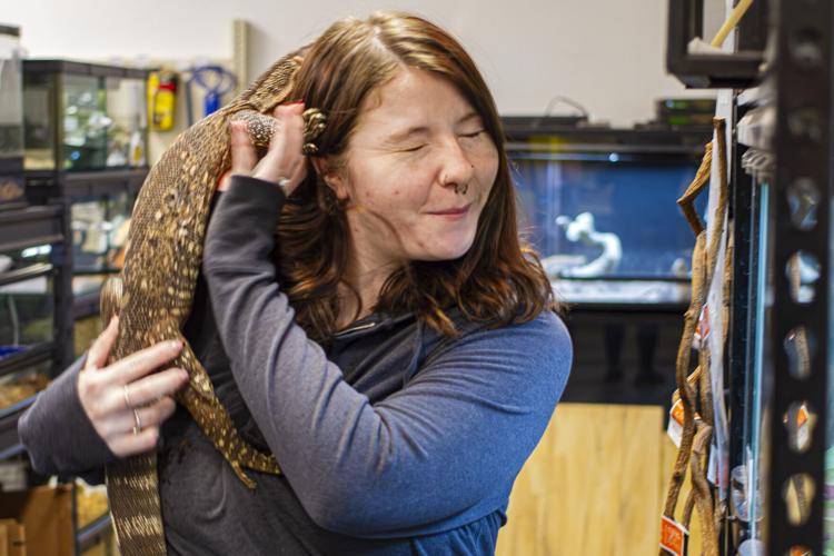Snakes and Ladders Local woman finds purpose in combination exotic pet