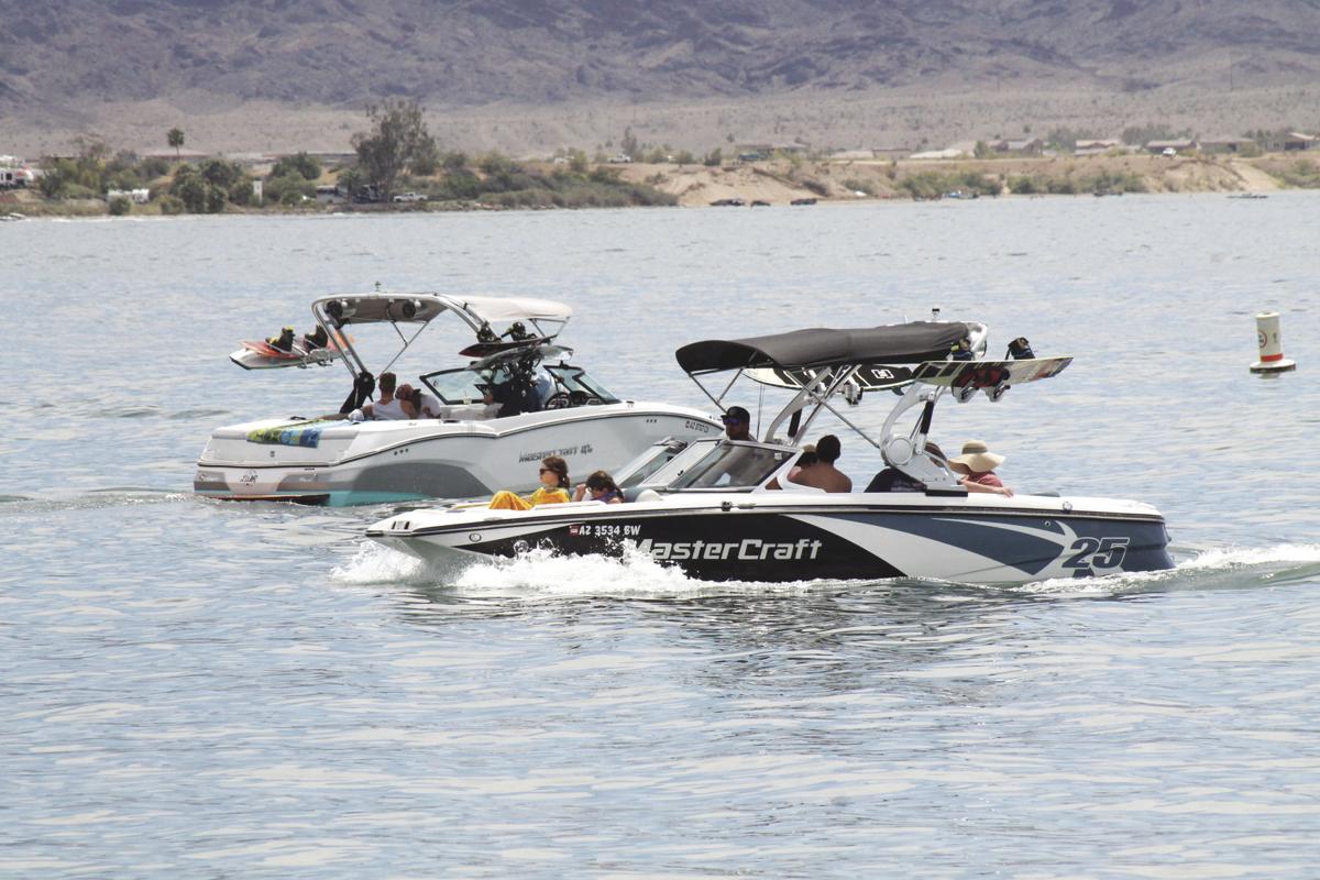 Residents flock to Lake Havasu despite pandemic as temps soar to triple