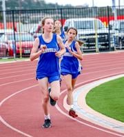 Lady Spikes finish on top at home track meet