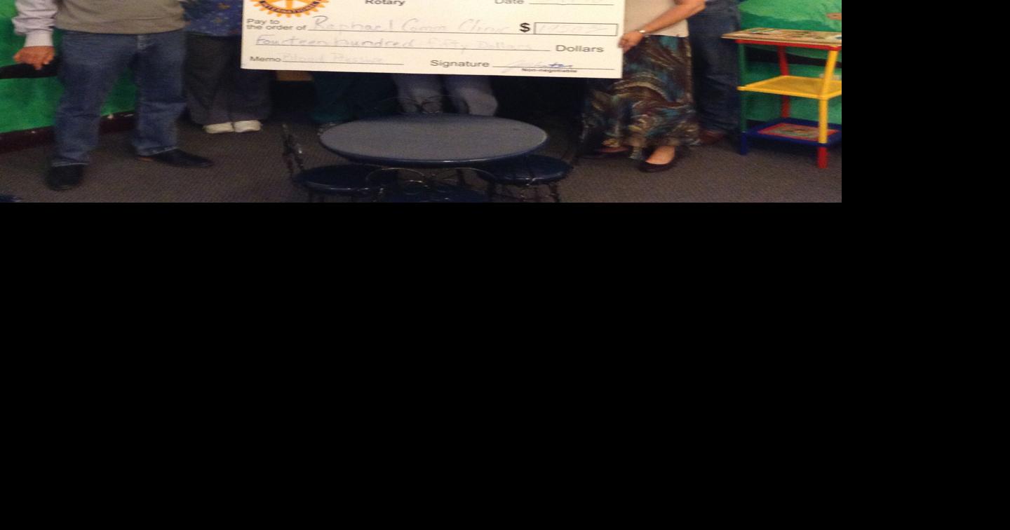 Kerrville Morning Rotary makes donation to Raphael Free Clinic