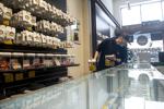 Matty Coen looks through cannabis product