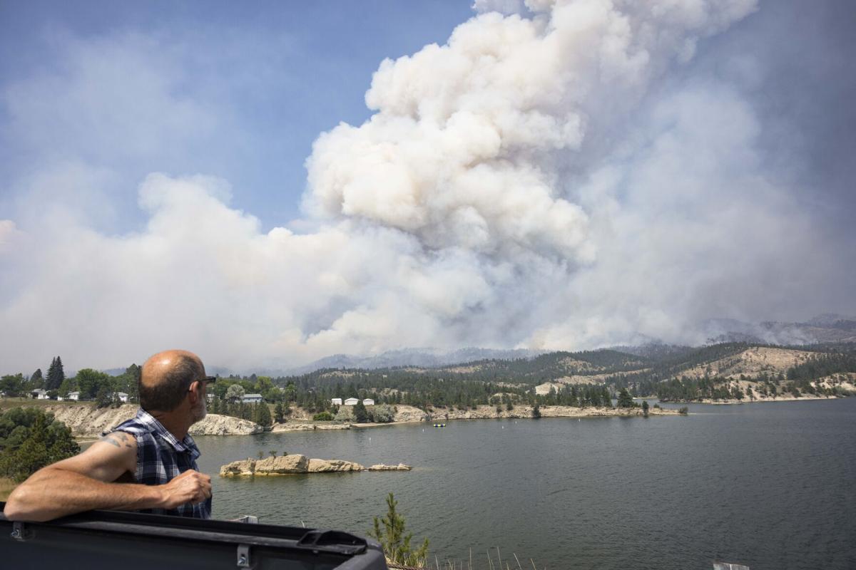 Spectators watch the Horse Gulch fire burn