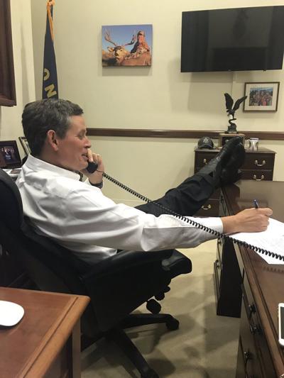 Sen. Steve Daines speaks with constituents during a tele-town hall meeting from his Washington D.C. office on June 28, 2017