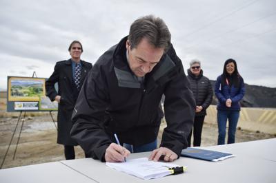 Gov. Steve Bullock signs the final Natural Resource Damage Program East Helena Restoration Plan