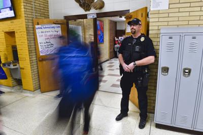 Capital High students move from class to class around School Resource Officer Andrew Barton in this file photo from 2019.