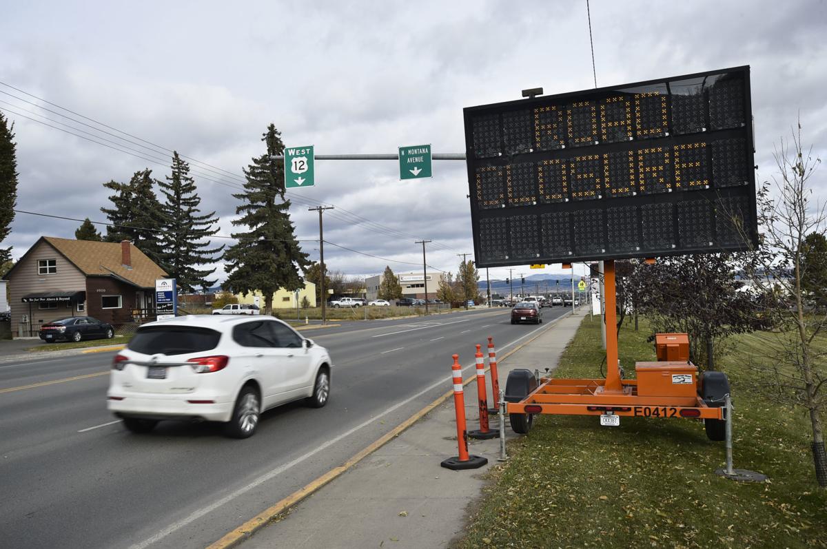 An automated sign warns Montana Ave. drivers