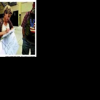 Deputies detain data center petitioner at fair