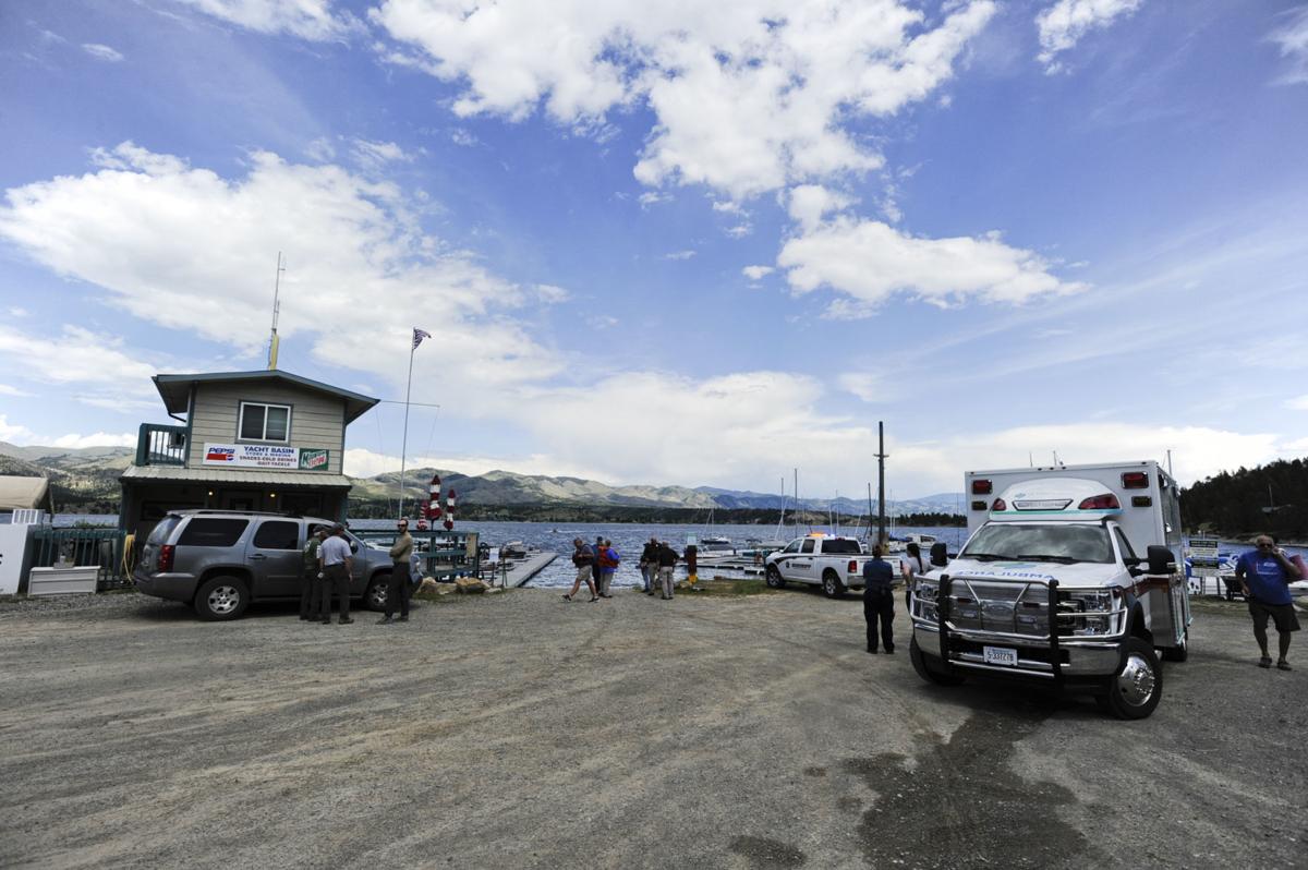 Emergency responders stage at the Yacht Basin Marina