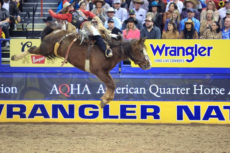 National Finals Rodeo: Wyoming's Cole Reiner wins bareback; Lisa Lockhart  and Chase Brooks place 2nd