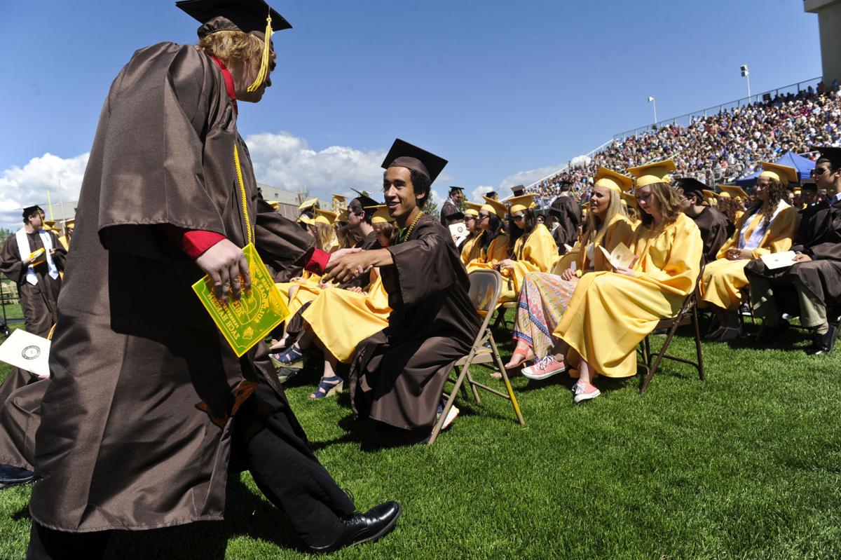 Capital High graduates celebrate the first of many life achievements