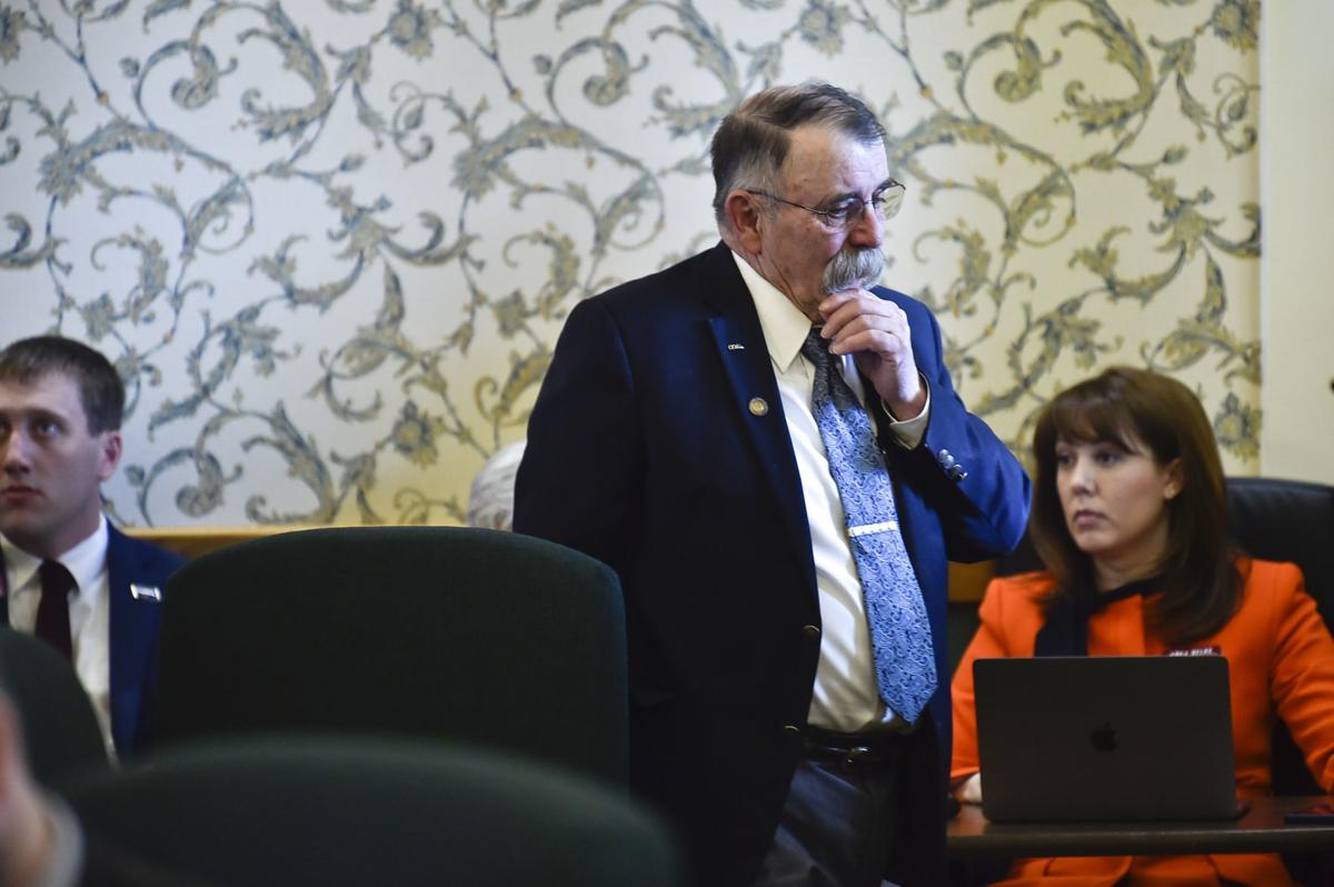 Sen. Duane Ankney, R-Colstrip, walks back to his seat