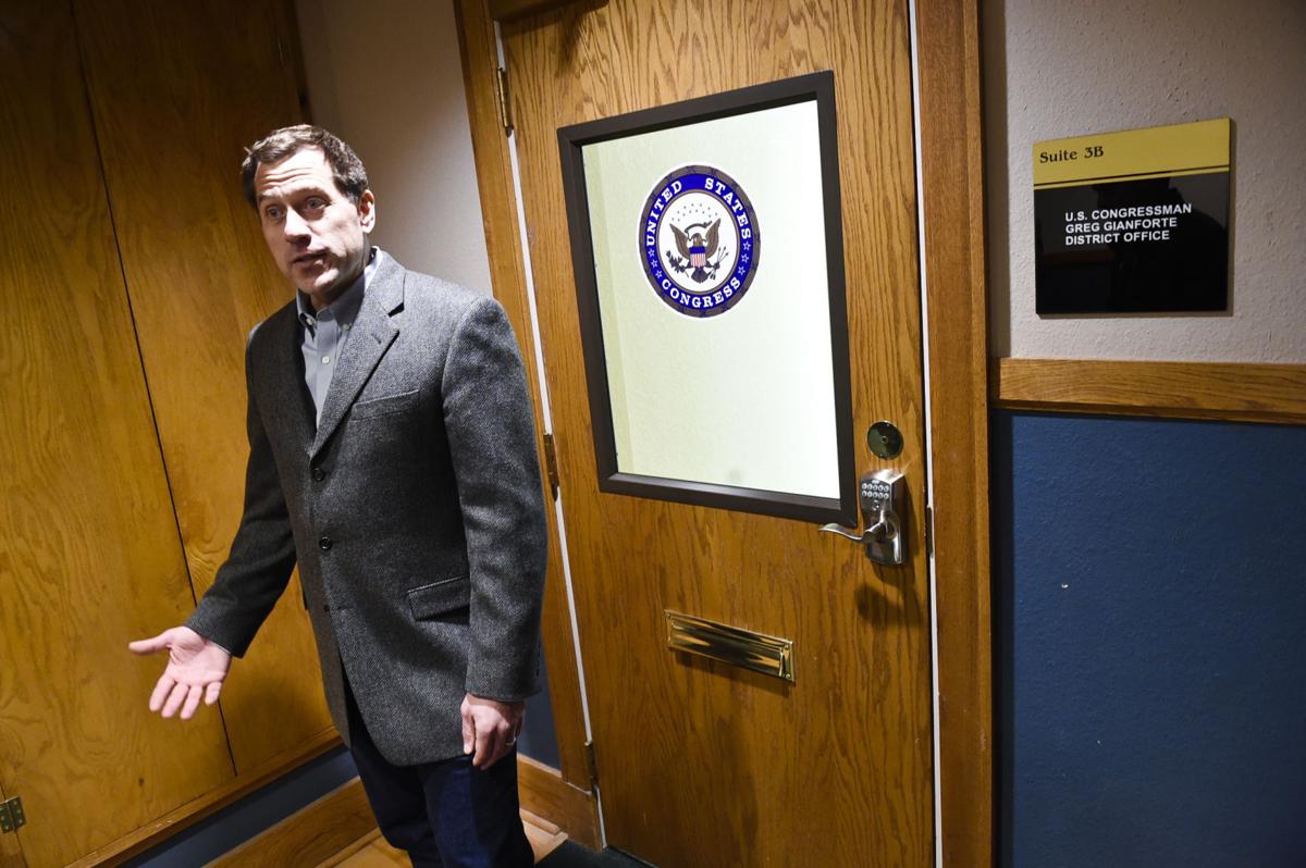 Grant Kier, Democratic U.S. House candidate, delivers a town hall meeting pledge to the office of Greg Gianforte, current Republican representative, Tuesday morning in Helena.