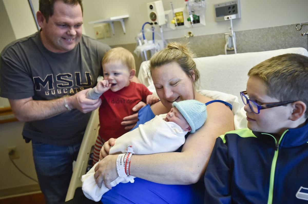 Paula Jones holds Wyatt Jones, the first Helena baby of the decade