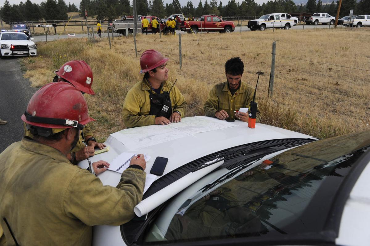 Roughly one hundred personnel and multiple aircraft help battle a lightening caused fire south of Helena Thursday afternoon.