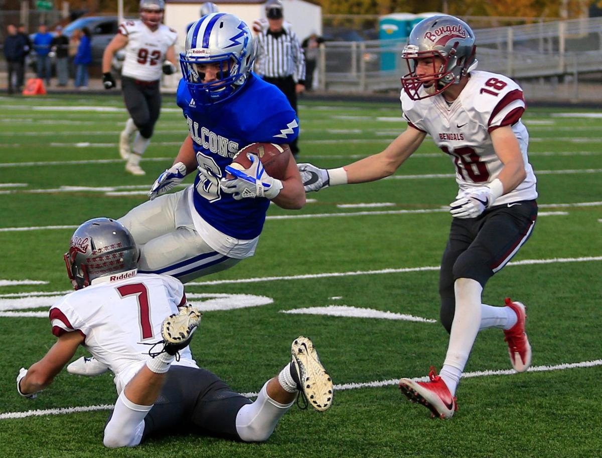 Helena's Caleb Ferguson tackles Jared Schaaf