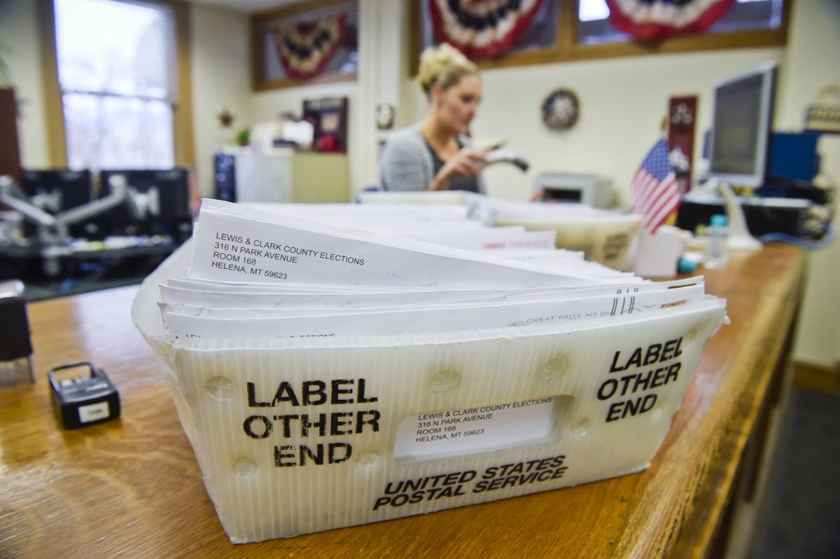 Bins of absentee ballots