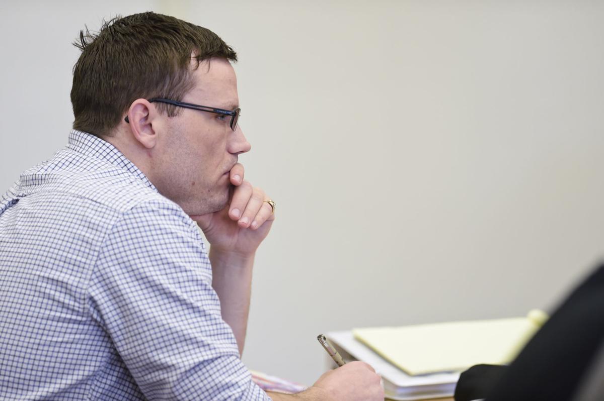 Andrew Pierce Lake listens to an opening statement during his trial at the Lewis and Clark County Courthouse
