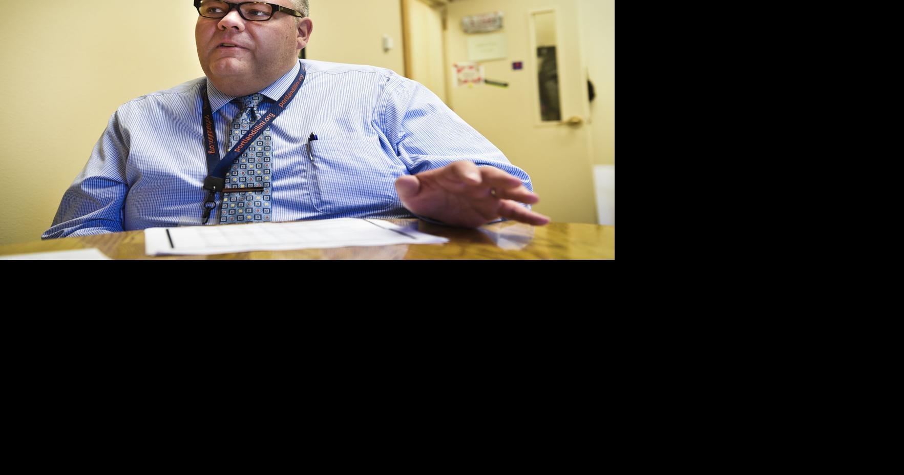 Making Your Mark: New director John Finn sees library as a community center