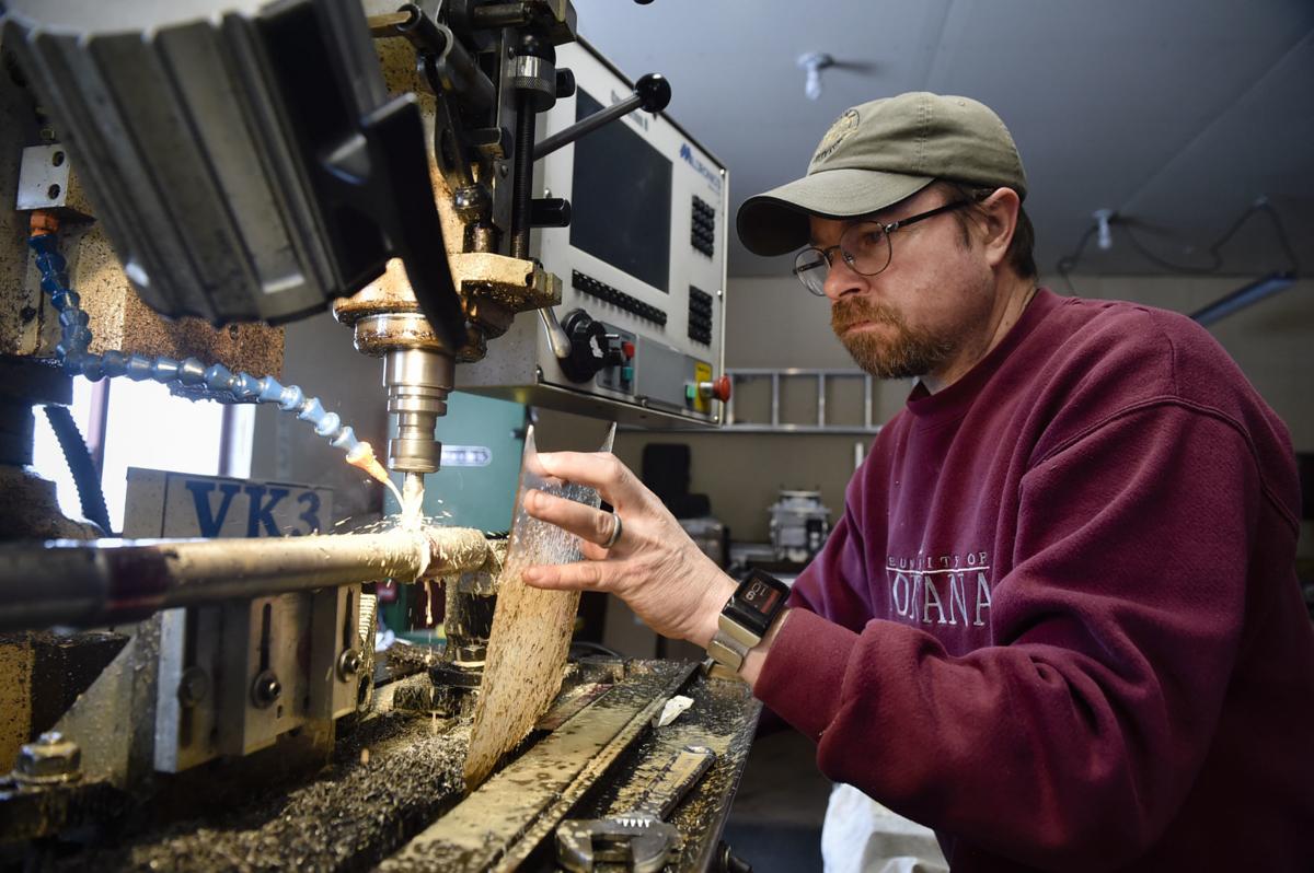 John McLaughlin machines a sight rail into the barrel